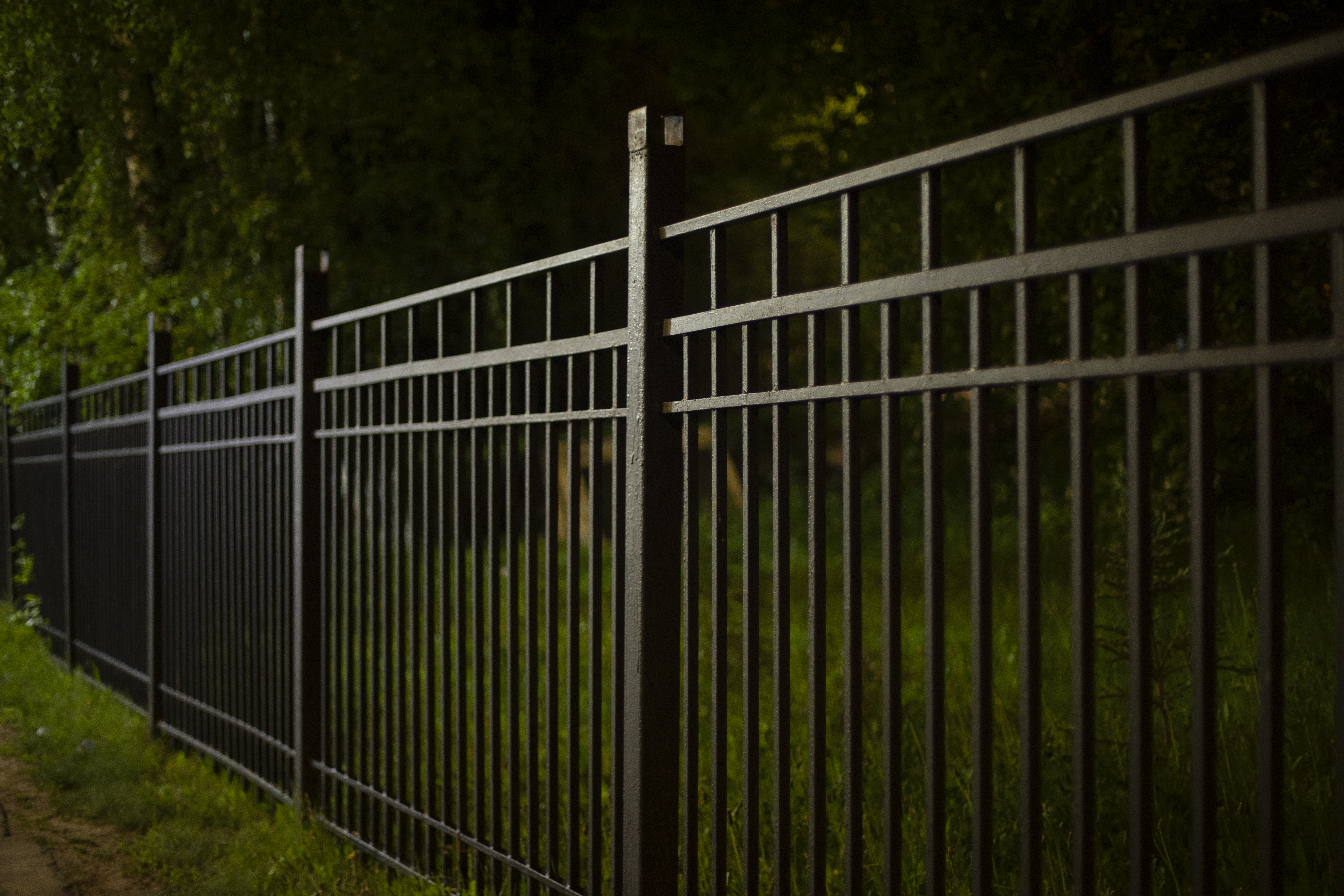 black fence at night
